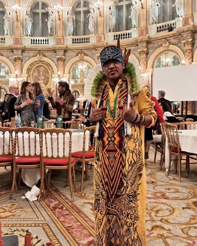 Pina Varinawa in full NOKE KOI regalia, speaking at the Global Sustainable Investment Forum in Paris, 2025.